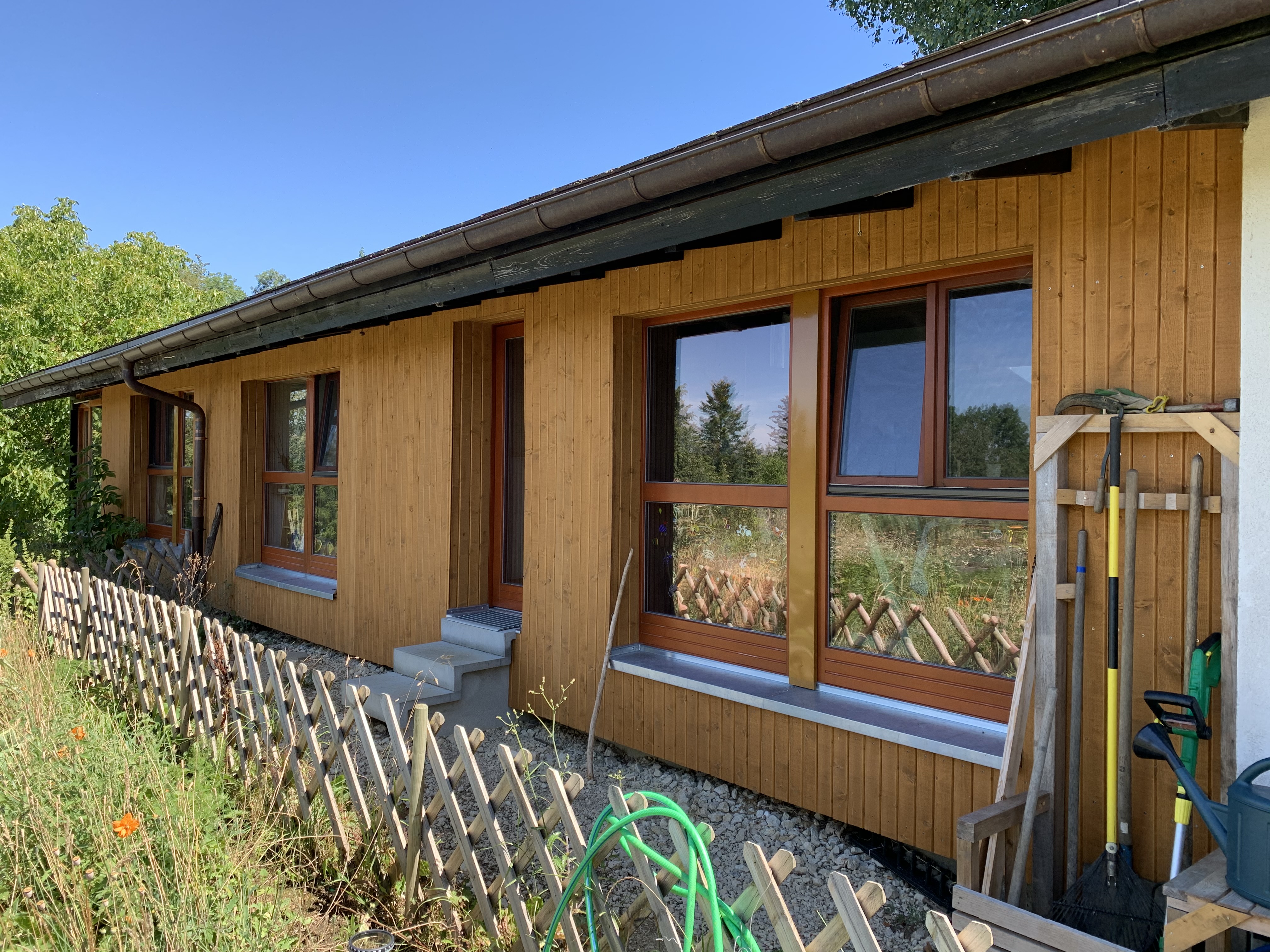 Revêtement de façade en bois - Quinet Sanitaire Le Bémont